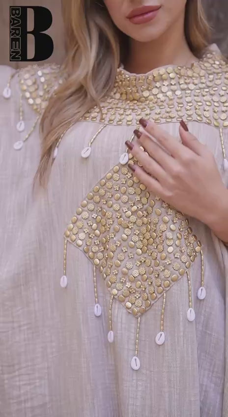 عباية الأصداف اليدوية